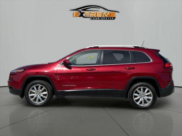 Photo of 2016 Deep Cherry Red Crystal Pearlcoat Jeep Cherokee