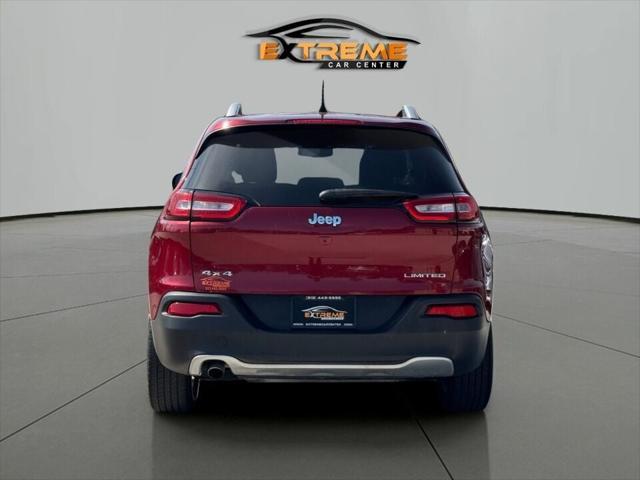 Photo of 2016 Deep Cherry Red Crystal Pearlcoat Jeep Cherokee