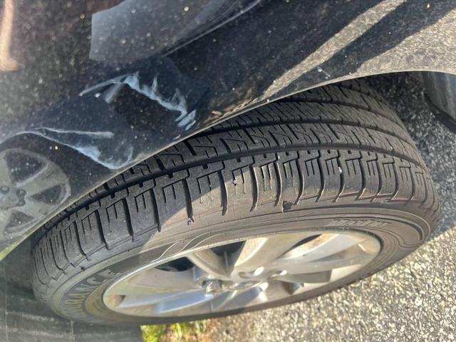 Photo of 2015 Super Black Nissan Sentra