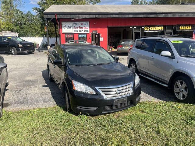 Photo of 2015 Super Black Nissan Sentra