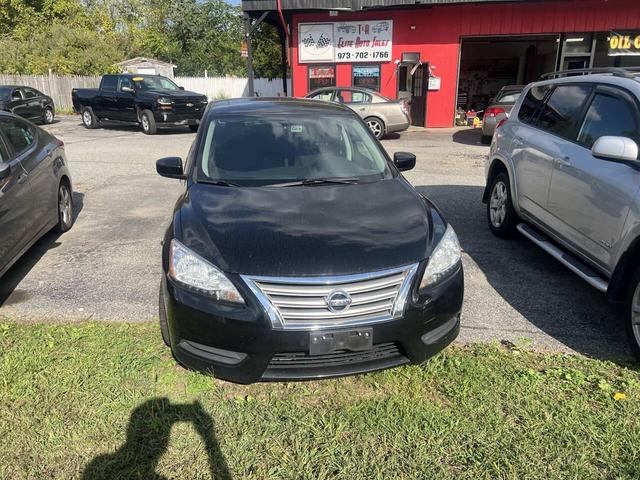 Photo of 2015 Super Black Nissan Sentra