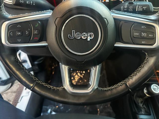 Photo of 2021 Bright White Clearcoat Jeep Wrangler Unlimited