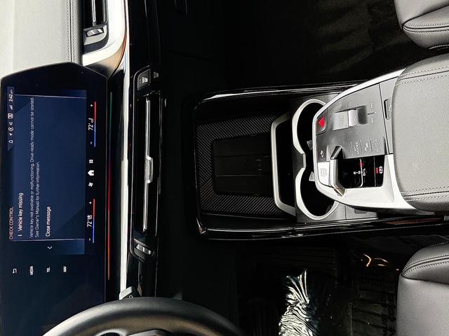 Photo of 2024 Black Sapphire Metallic - 475 BMW X1