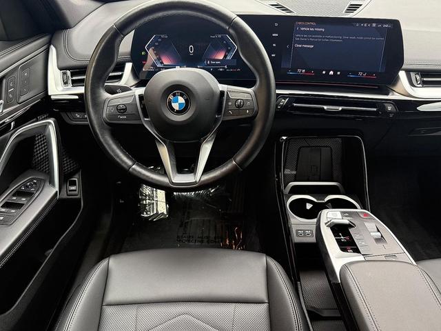 Photo of 2024 Black Sapphire Metallic - 475 BMW X1