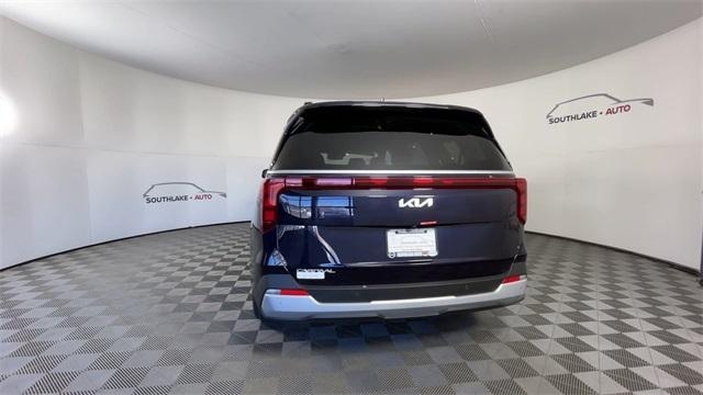 Photo of 2025 Deep Chroma Blue Kia Carnival