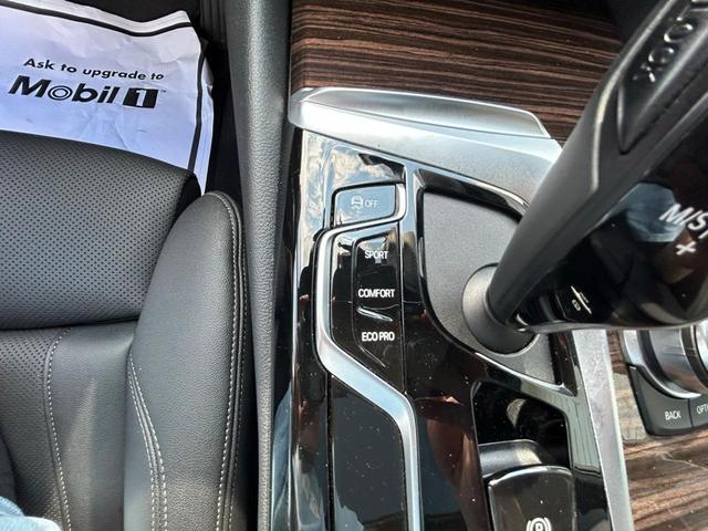 Photo of 2022 Black Sapphire Metallic BMW 540