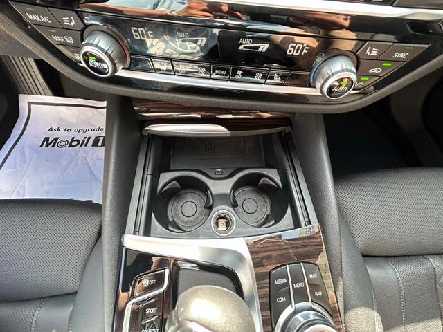 Photo of 2022 Black Sapphire Metallic BMW 540