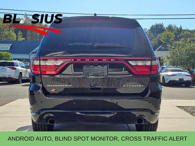Photo of 2023 DB Black Crystal Clearcoat Dodge Durango