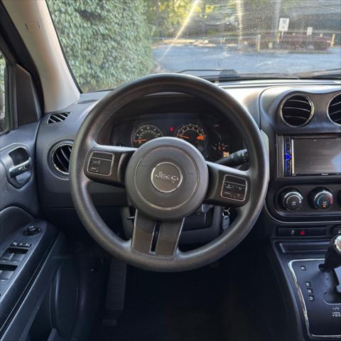 Photo of 2015 Deep Cherry Red Crystal Pearlcoat Jeep Compass