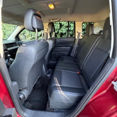 Photo of 2015 Deep Cherry Red Crystal Pearlcoat Jeep Compass