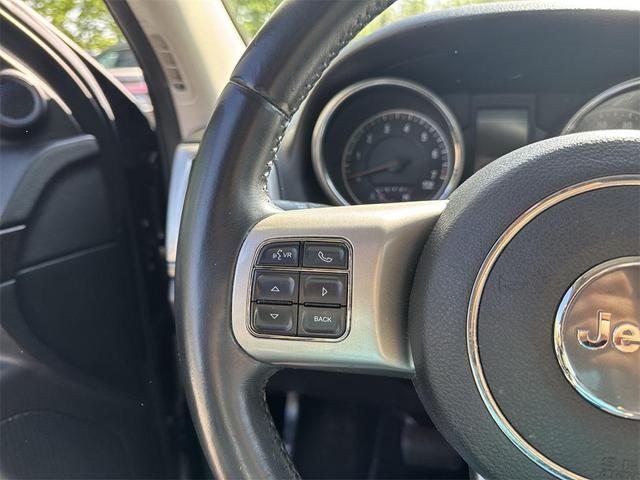 Photo of 2012 Black Forest Green Pearlcoat Jeep Grand Cherokee