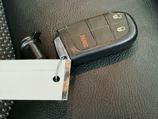 Photo of 2021 Spitfire Orange Clearcoat Jeep Compass