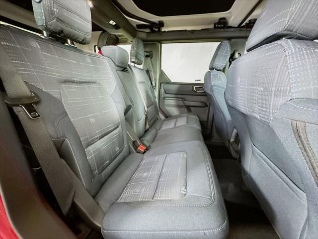 Photo of 2025 Ruby Red Metallic Tinted Clearcoat Ford Bronco