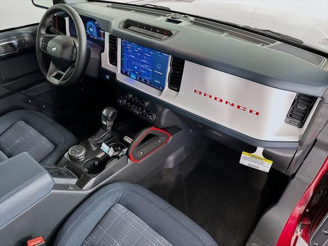 Photo of 2025 Ruby Red Metallic Tinted Clearcoat Ford Bronco