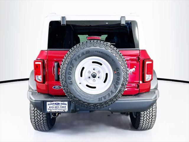 Photo of 2025 Ruby Red Metallic Tinted Clearcoat Ford Bronco