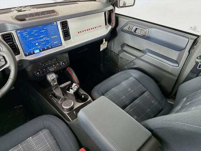 Photo of 2025 Ruby Red Metallic Tinted Clearcoat Ford Bronco