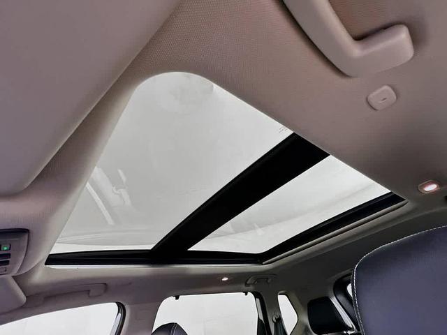 Photo of 2023 Pearl White Tricoat Nissan Rogue