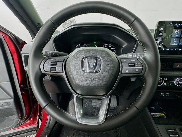 Photo of 2025 Radiant Red Metallic Honda CR-V Hybrid