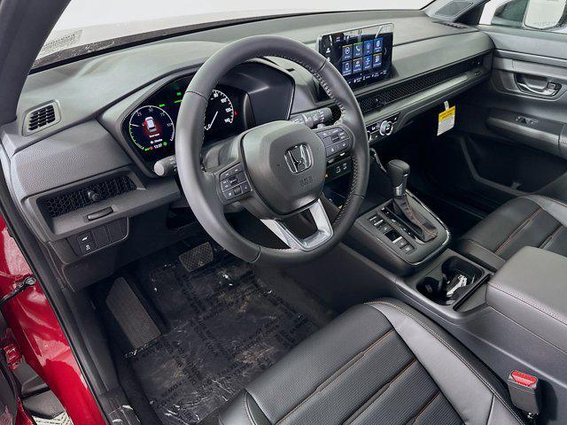 Photo of 2025 Radiant Red Metallic Honda CR-V Hybrid