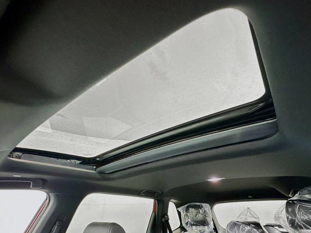 Photo of 2025 Radiant Red Metallic Honda CR-V Hybrid