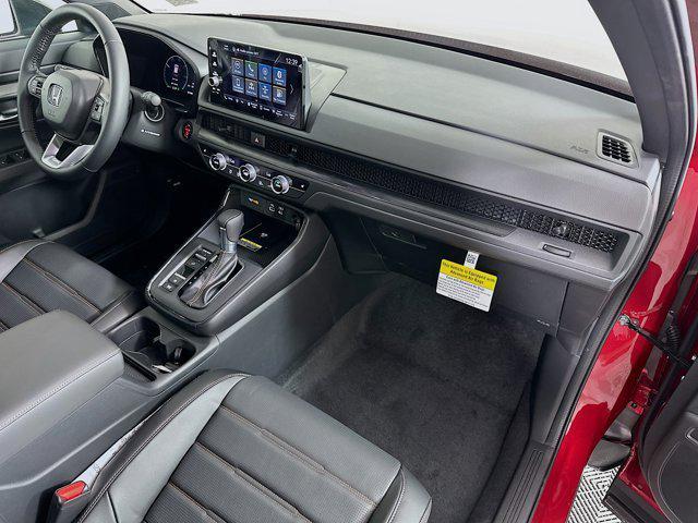 Photo of 2025 Radiant Red Metallic Honda CR-V Hybrid