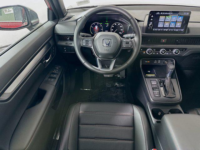 Photo of 2025 Radiant Red Metallic Honda CR-V Hybrid