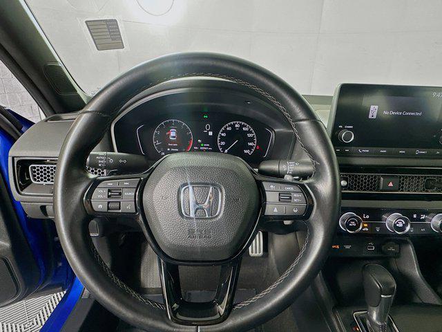 Photo of 2023 Boost Blue Pearl Honda Civic
