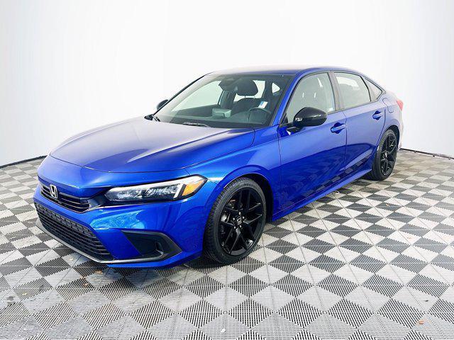 Photo of 2023 Boost Blue Pearl Honda Civic