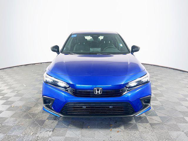 Photo of 2023 Boost Blue Pearl Honda Civic