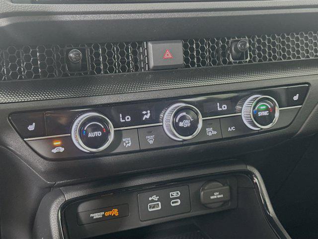 Photo of 2025 Solar Silver Metallic Honda CR-V Hybrid