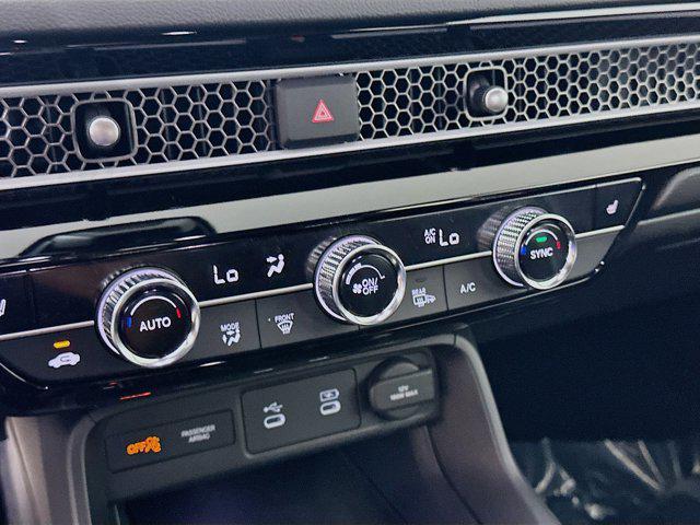 Photo of 2025 Platinum White Pearl Honda Civic Hybrid