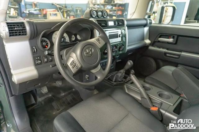 Photo of 2011 Army Green with White Roof Toyota FJ Cruiser