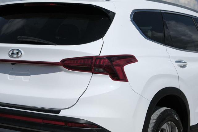 Photo of 2023 Serenity White Pearl Hyundai SANTA FE