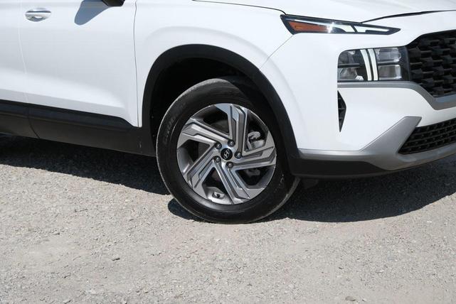 Photo of 2023 Serenity White Pearl Hyundai SANTA FE