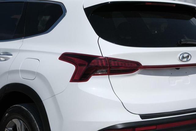 Photo of 2023 Serenity White Pearl Hyundai SANTA FE