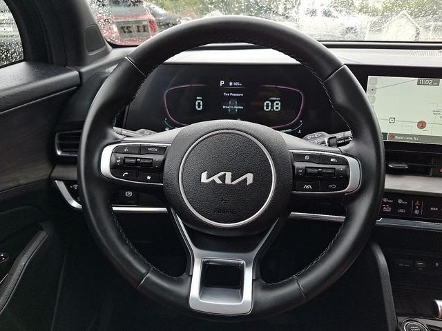 Photo of 2023 Ebony Black Kia Sportage