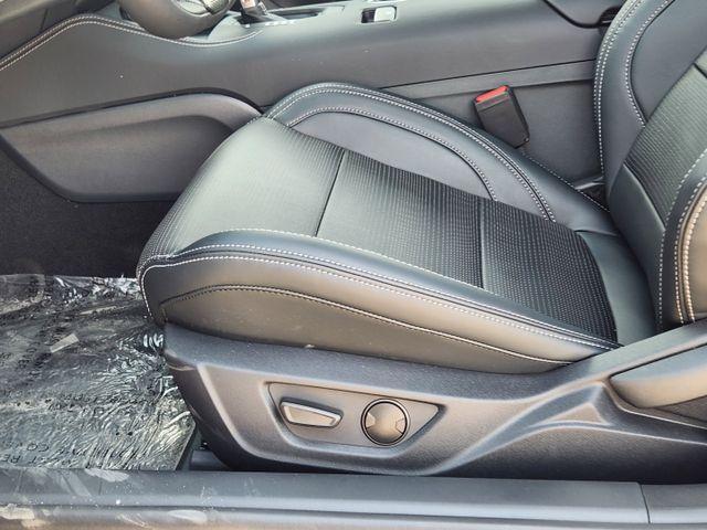 Photo of 2025 Magenta Ford Mustang