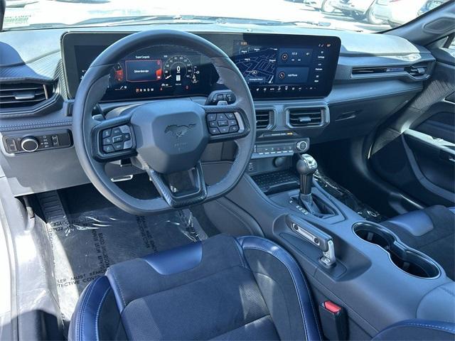 Photo of 2024 Vapor Blue Metallic Ford Mustang