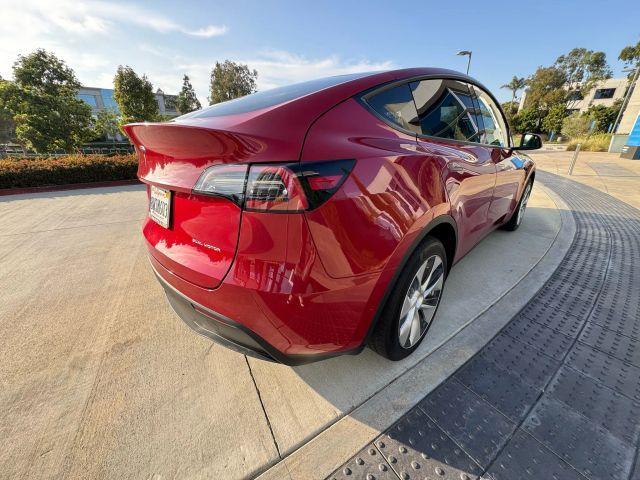 Photo of 2021 Red Multi Tesla Model Y