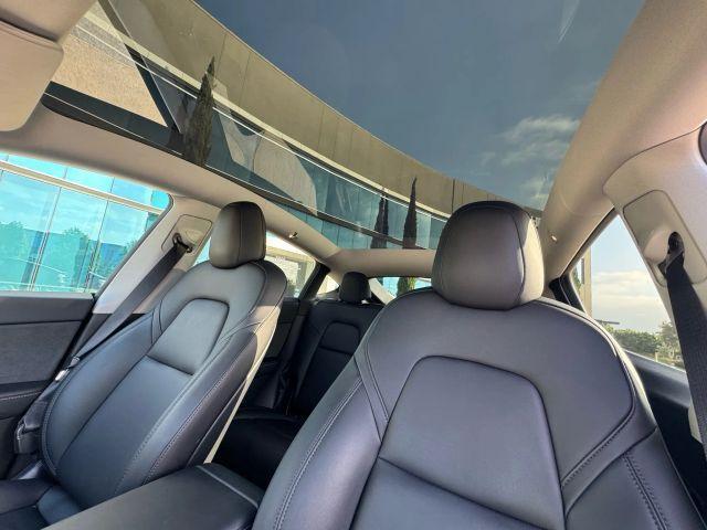 Photo of 2021 Red Multi Tesla Model Y