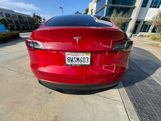 Photo of 2021 Red Multi Tesla Model Y