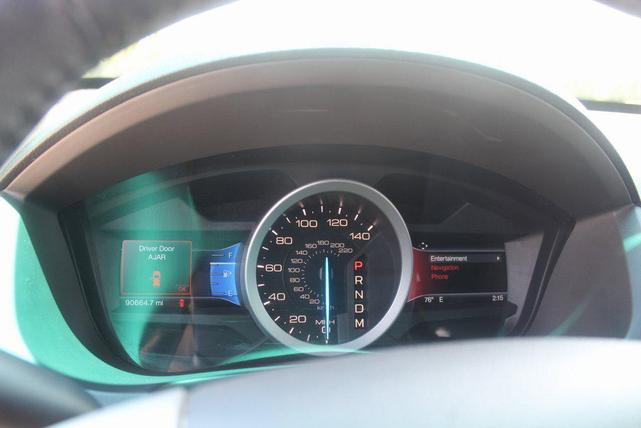 Photo of 2015 Tan Ford Explorer