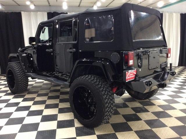 Photo of 2012 Black Clearcoat Jeep Wrangler Unlimited