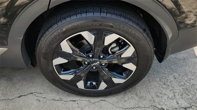 Photo of 2024 Ebony Black Kia Sportage