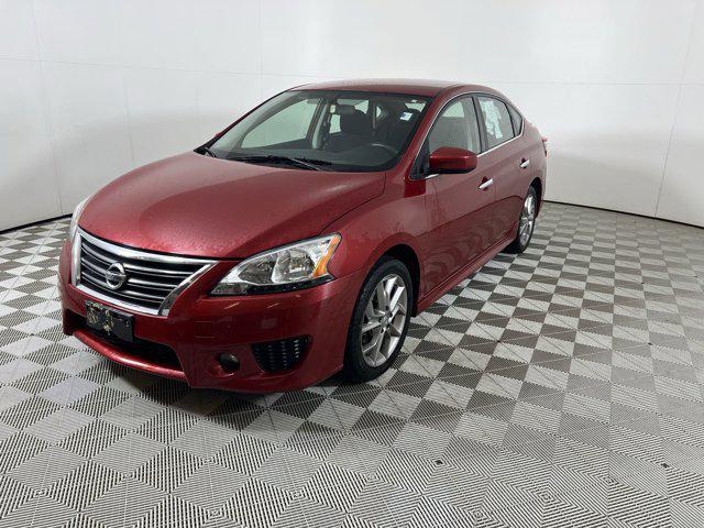 Photo of 2013 Red Brick Nissan Sentra