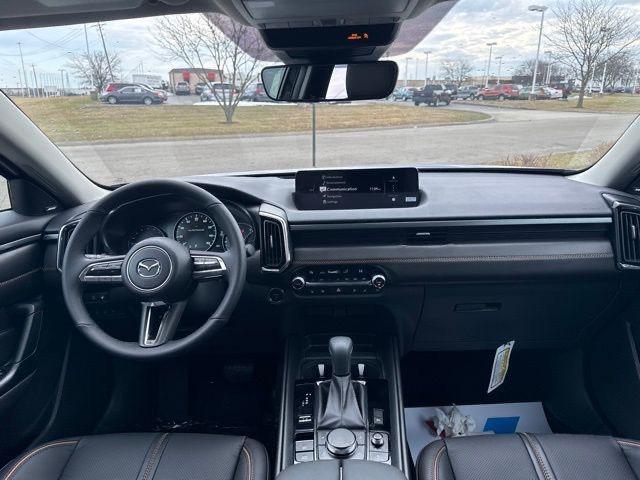 Photo of 2025 Ingot Blue Metallic Mazda CX-50 Hybrid