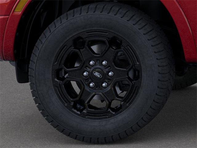 Photo of 2025 Ruby Red Metallic Tinted Clearcoat Ford Ranger