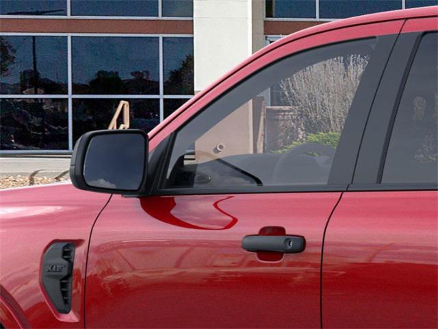 Photo of 2025 Ruby Red Metallic Tinted Clearcoat Ford Ranger