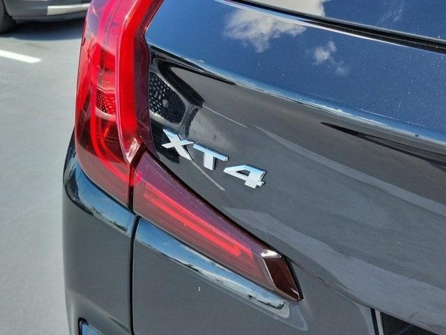 Photo of 2023 Stellar Black Metallic Cadillac XT4