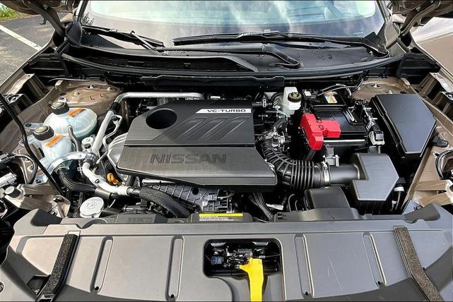 Photo of 2025 2t Dk Beige Blk Nissan Rogue